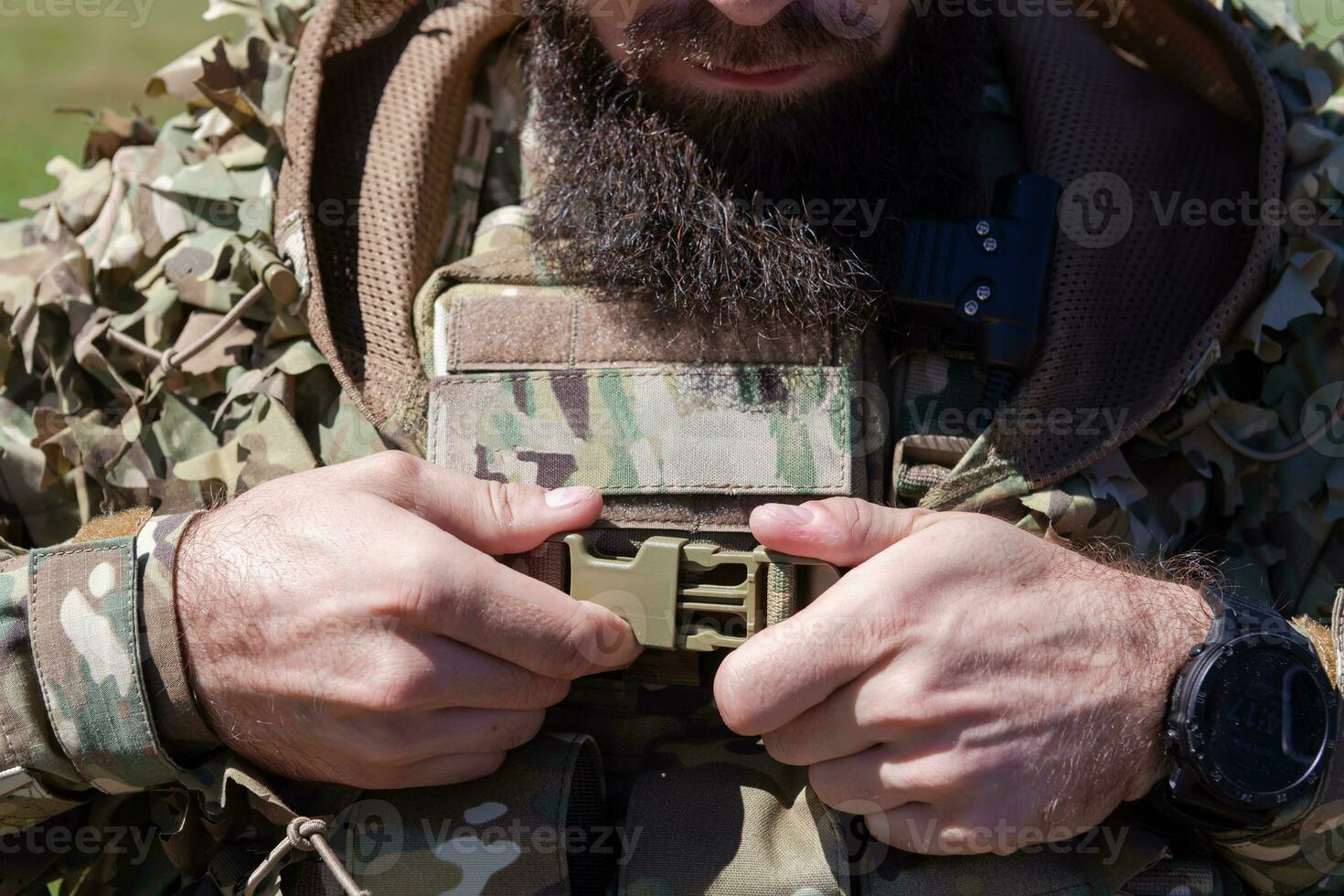 special operations soldiers team preparing tactical and communication gear for action battle. Long distance sniper team in checking gear for action photo