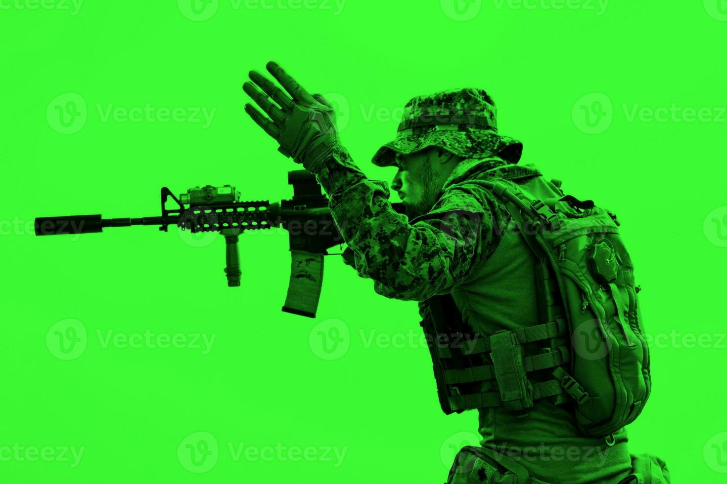soldier in action aiming laseer sight optics photo