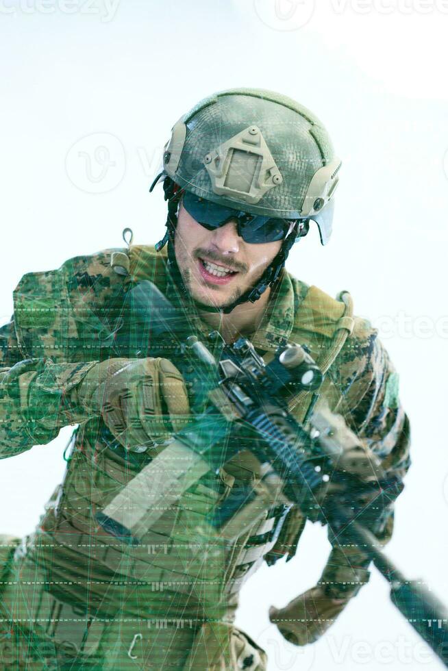 soldier in action aiming laseer sight optics photo