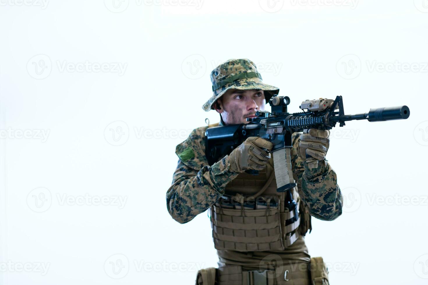 soldier in action aiming laseer sight optics photo