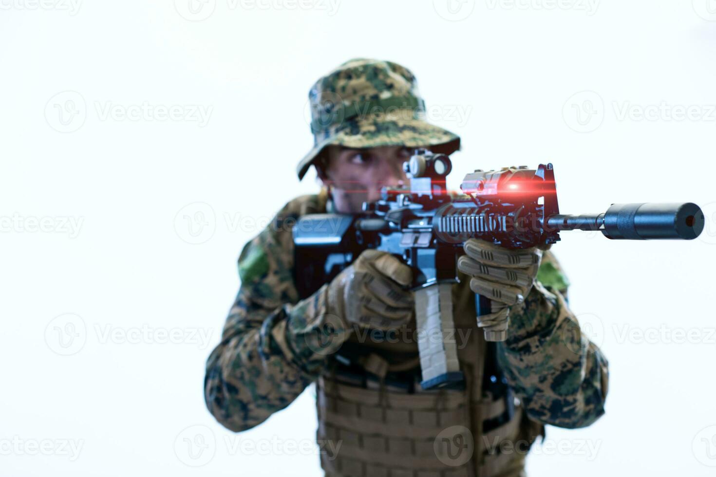 soldier in action aiming laseer sight optics photo