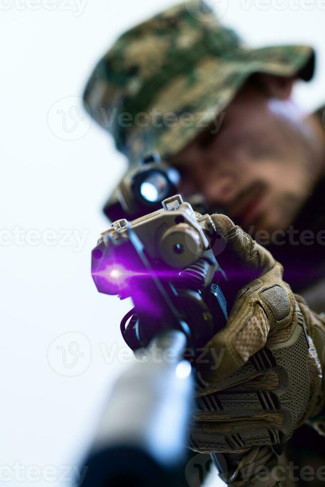 soldier in action aiming laseer sight optics photo