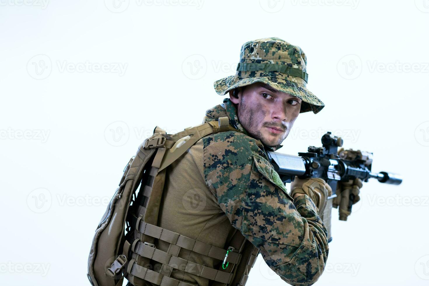 soldier in action aiming laseer sight optics photo