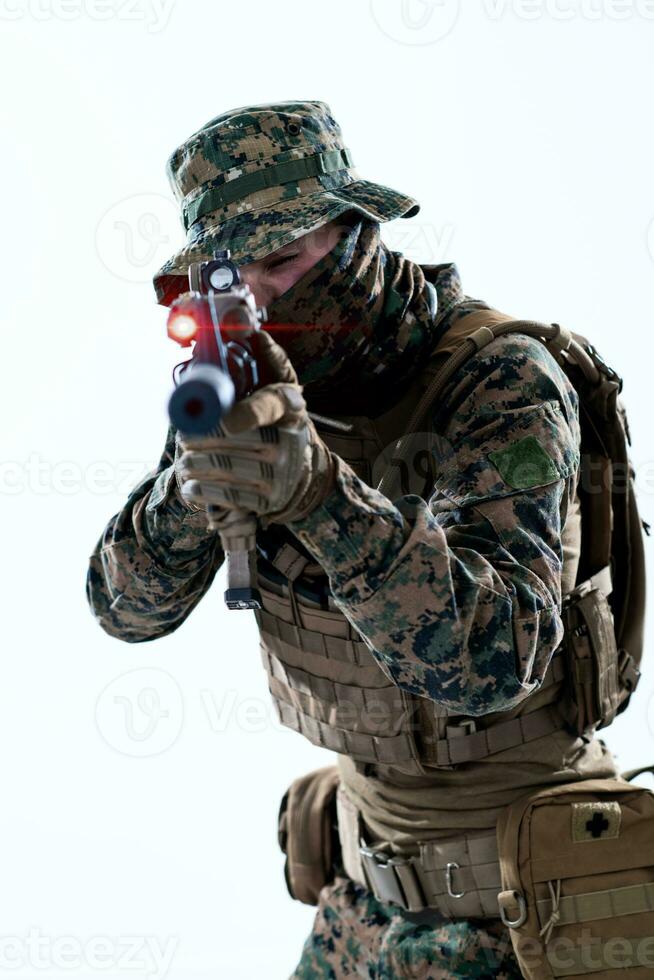 soldier in action aiming laseer sight optics photo