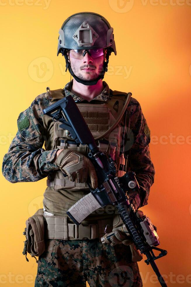 modern soldier against yellow background photo