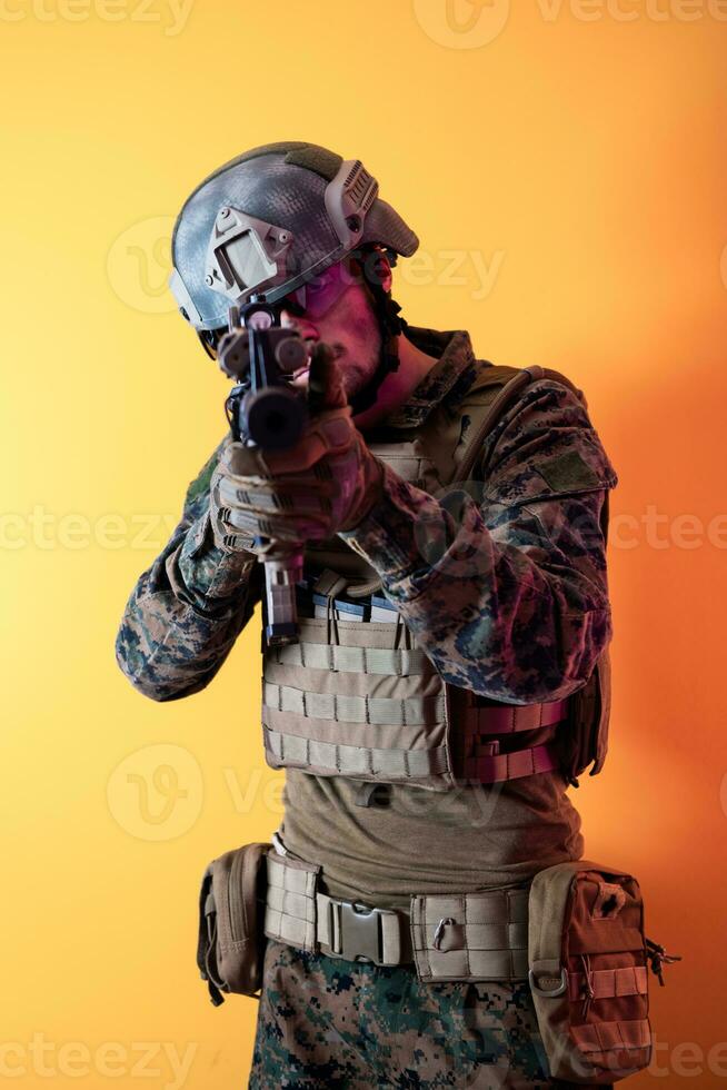 modern soldier against yellow background photo