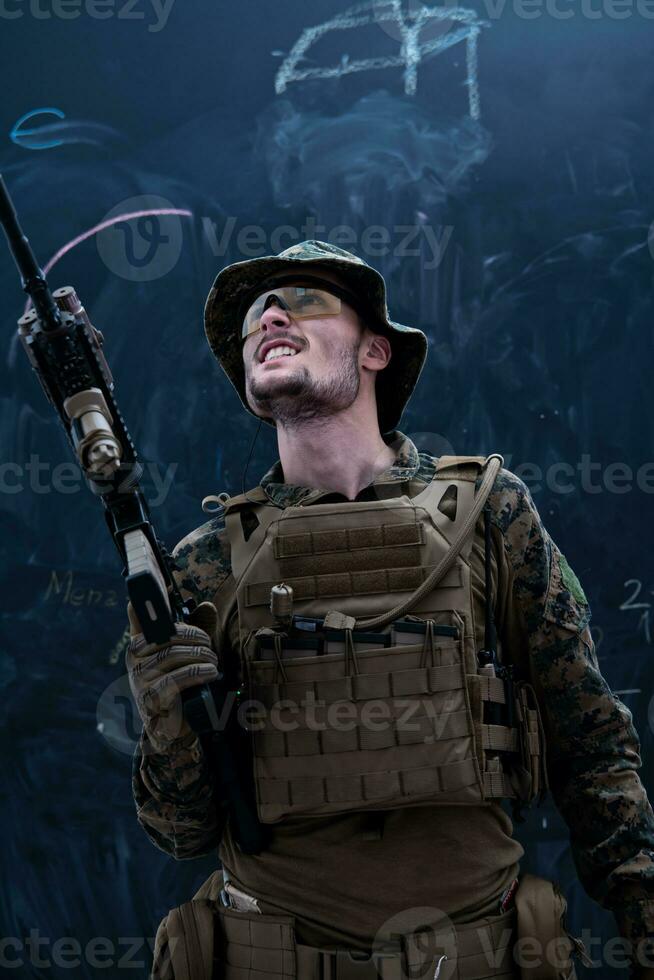 soldier potrait closeup in front of black chalkboard photo