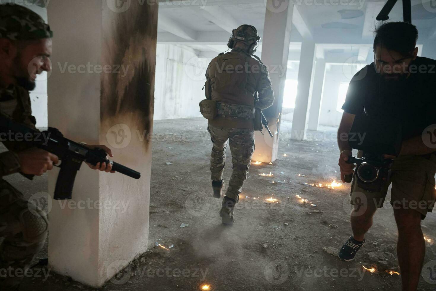 Videographer Taking Action Shoot of Soldiers in Action urban environment photo