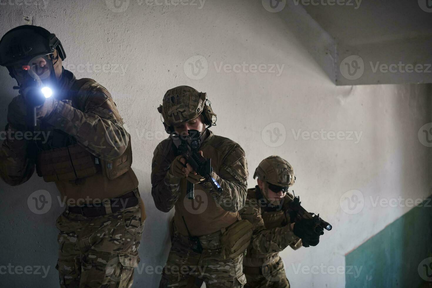 modern warfare soldiers ascent stairs in combat photo