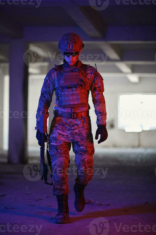 modern warfare soldier in urban environment photo