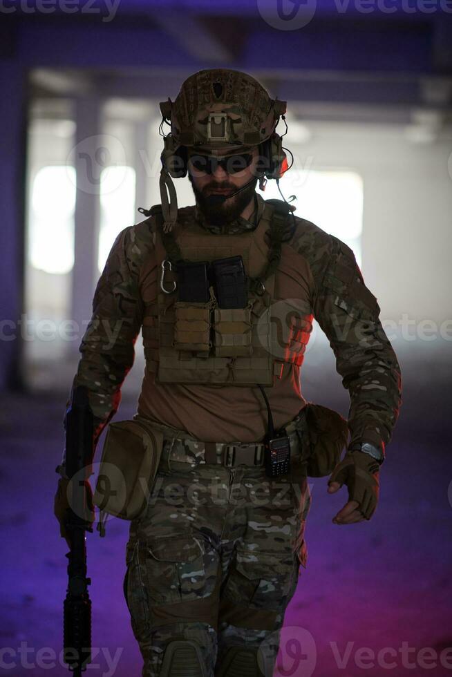 modern warfare soldier in urban environment photo