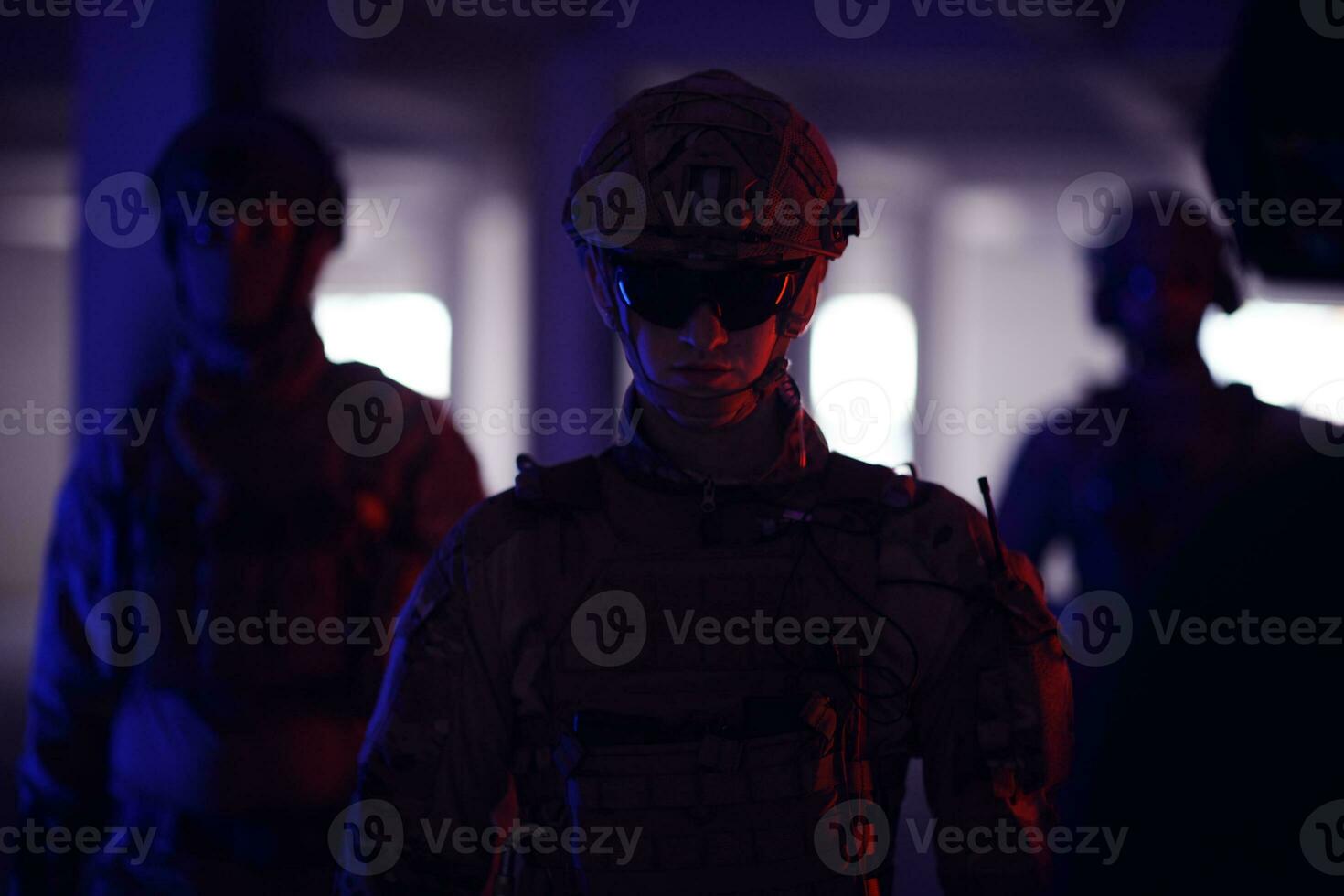 soldier squad team portrait in urban environment colored lightis photo