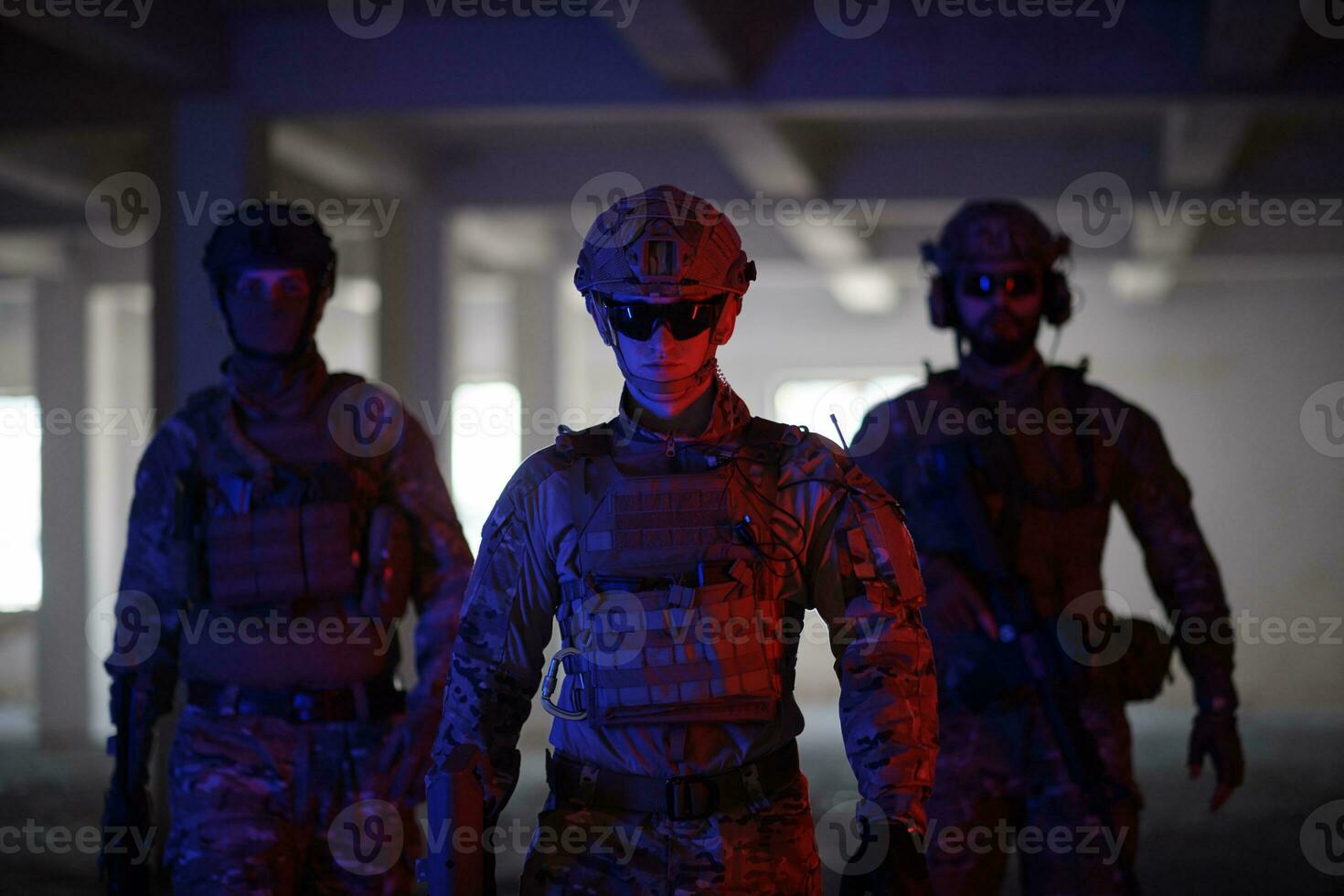 soldier squad team portrait in urban environment colored lightis photo