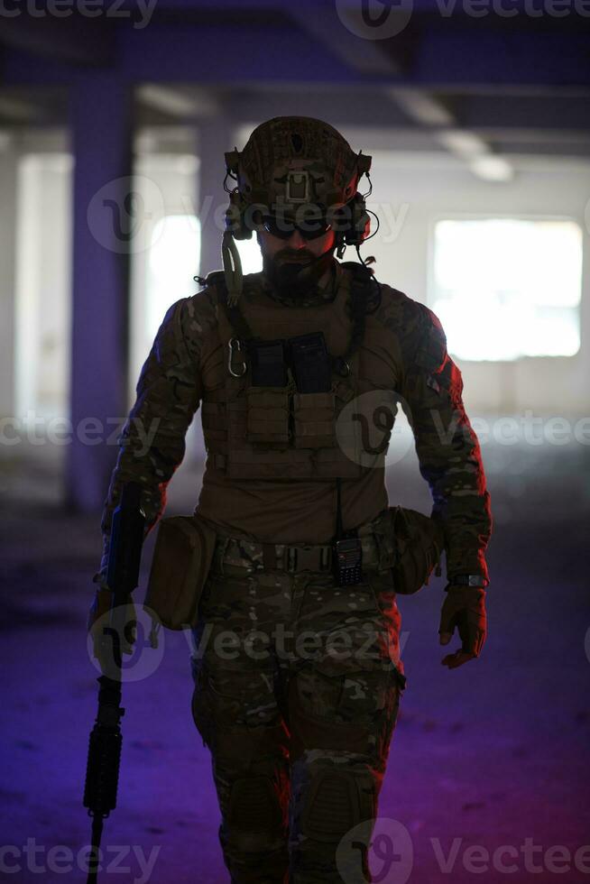 modern warfare soldier in urban environment photo