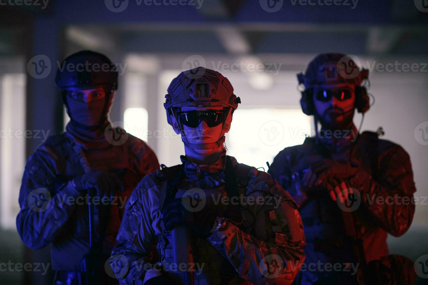 soldier squad team portrait in urban environment colored lightis photo