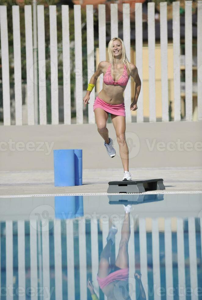 fitness exercise at poolside photo