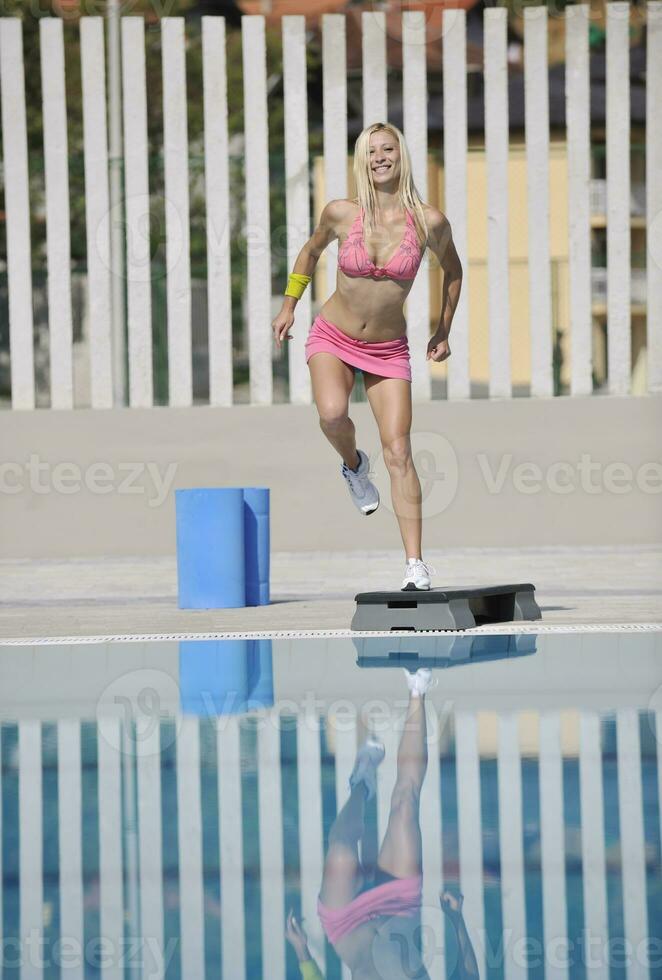 fitness exercise at poolside photo