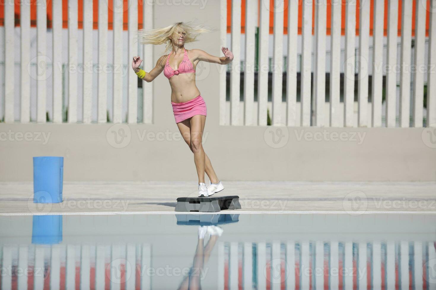 fitness exercise at poolside photo