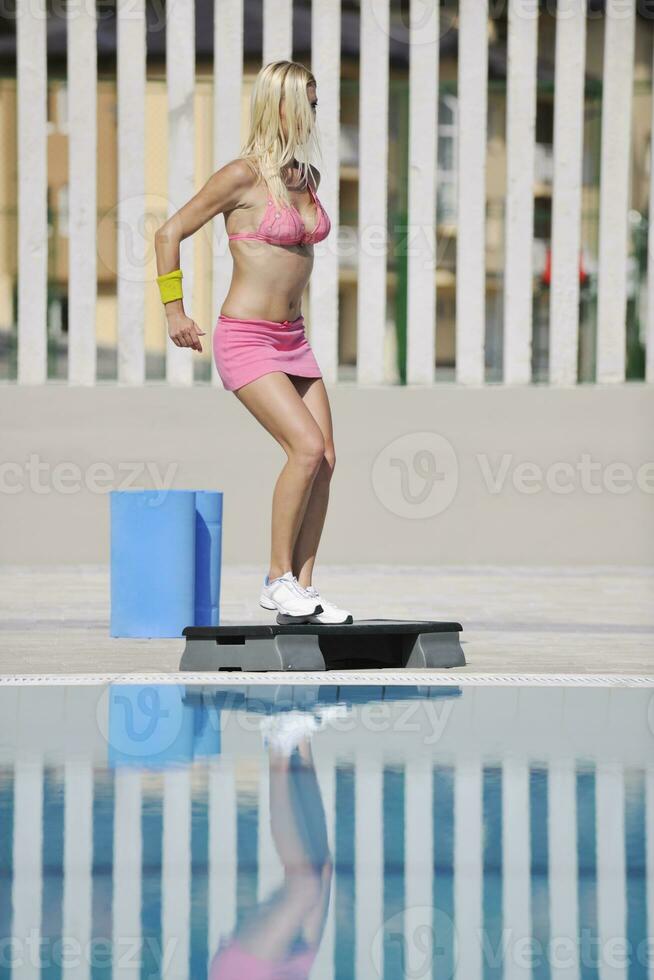 fitness exercise at poolside photo