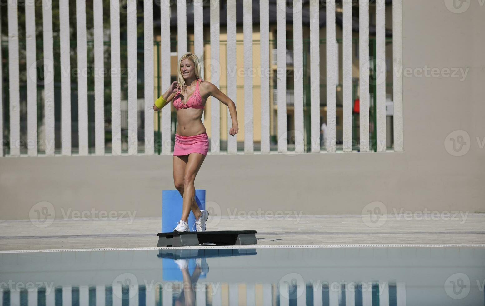 fitness exercise at poolside photo