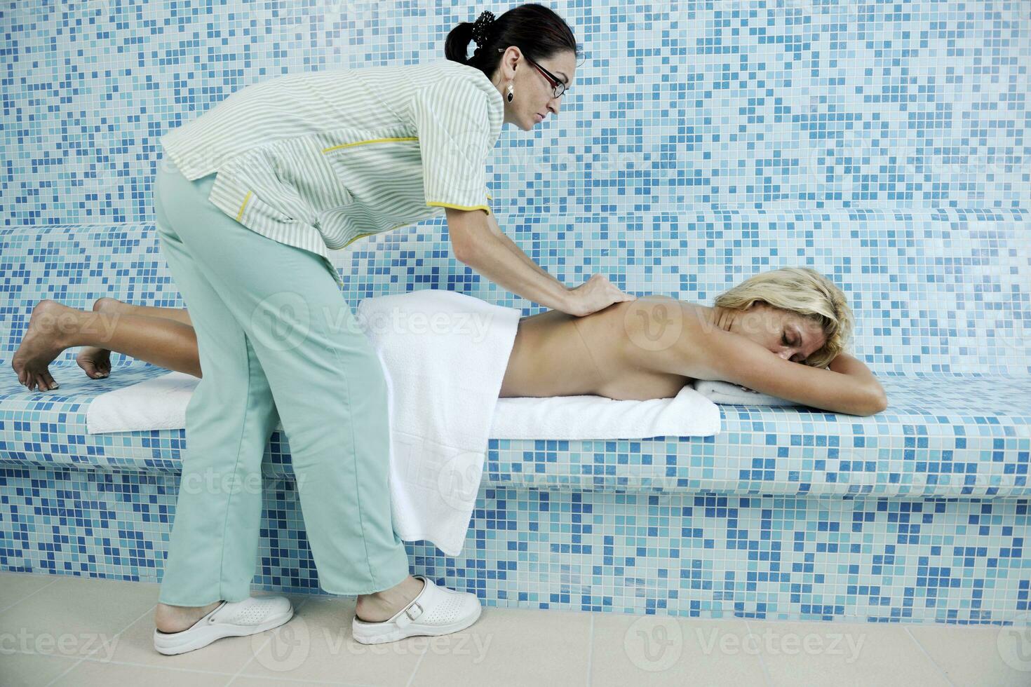 woman relaxing at spa and wellness photo