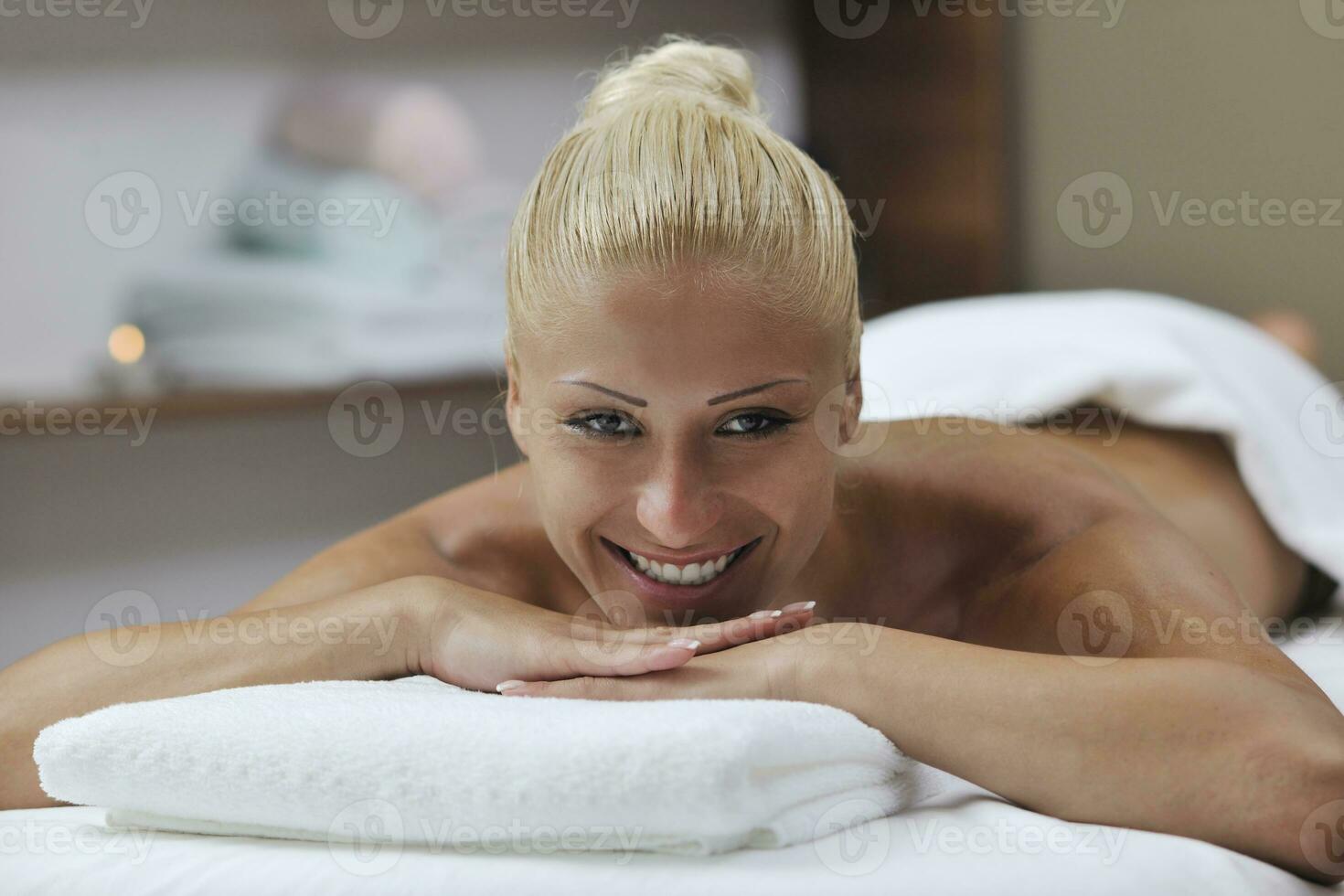 woman back massage treatment photo