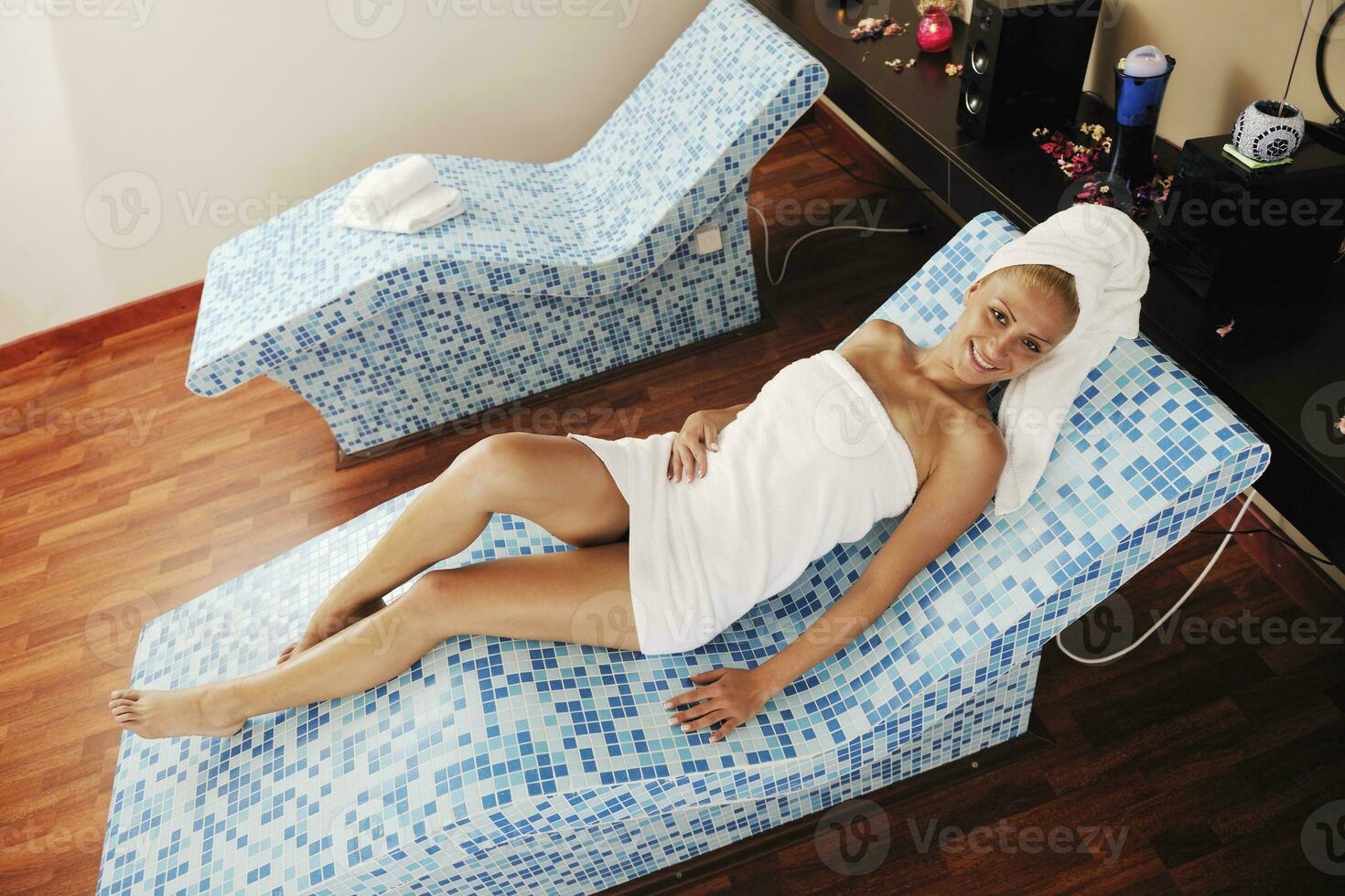 woman relaxing at spa and wellness photo