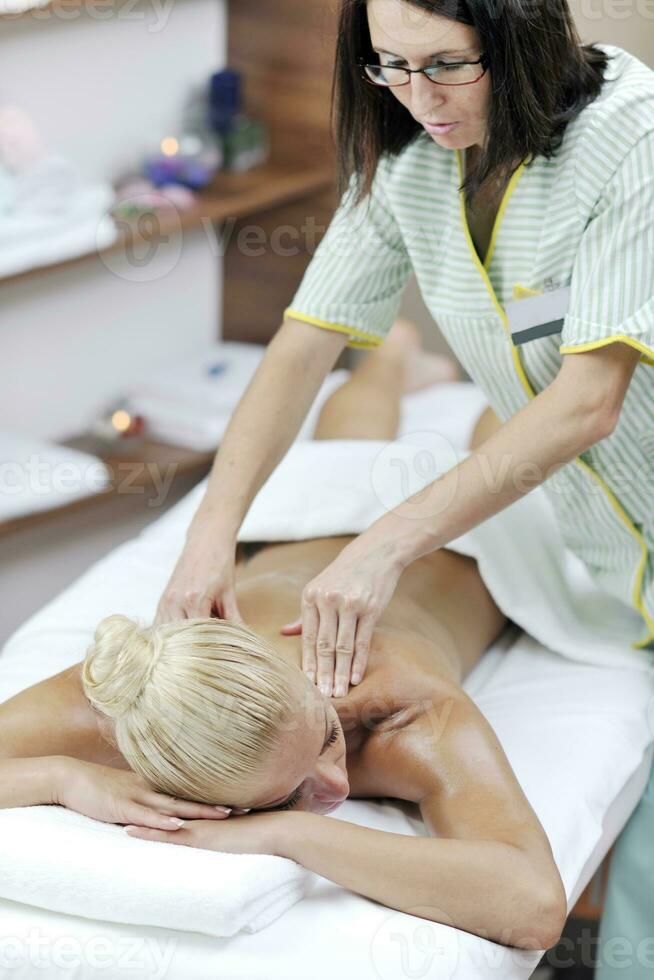 woman back massage treatment photo