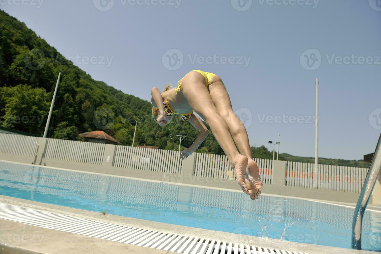 beautiful woman relax on swimming pool photo