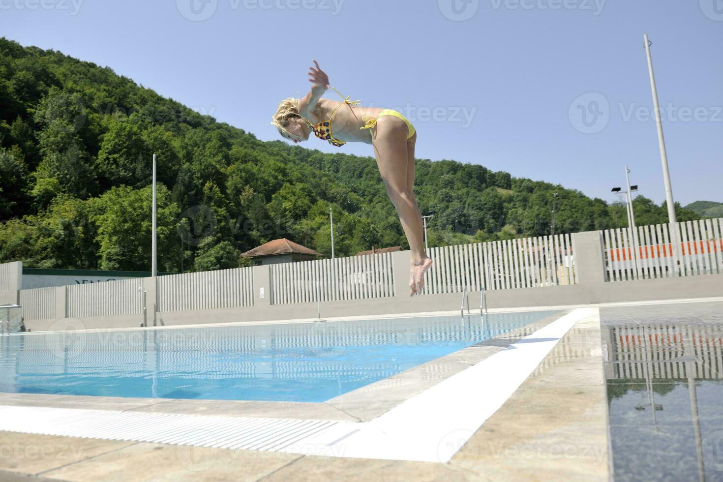 beautiful woman relax on swimming pool photo