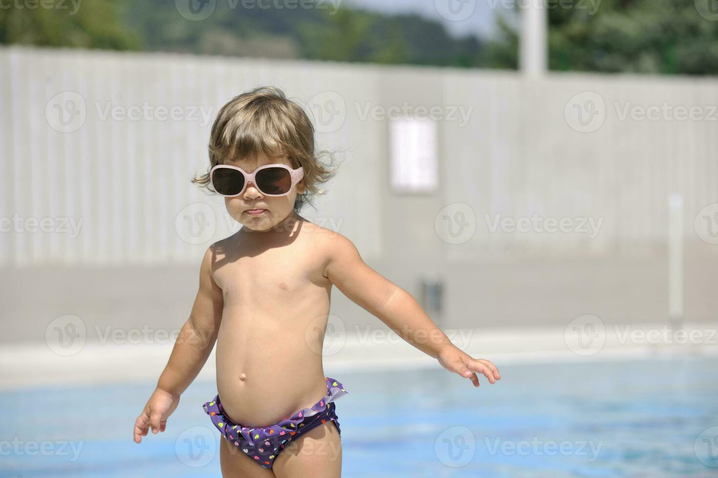 children on swimming pool photo