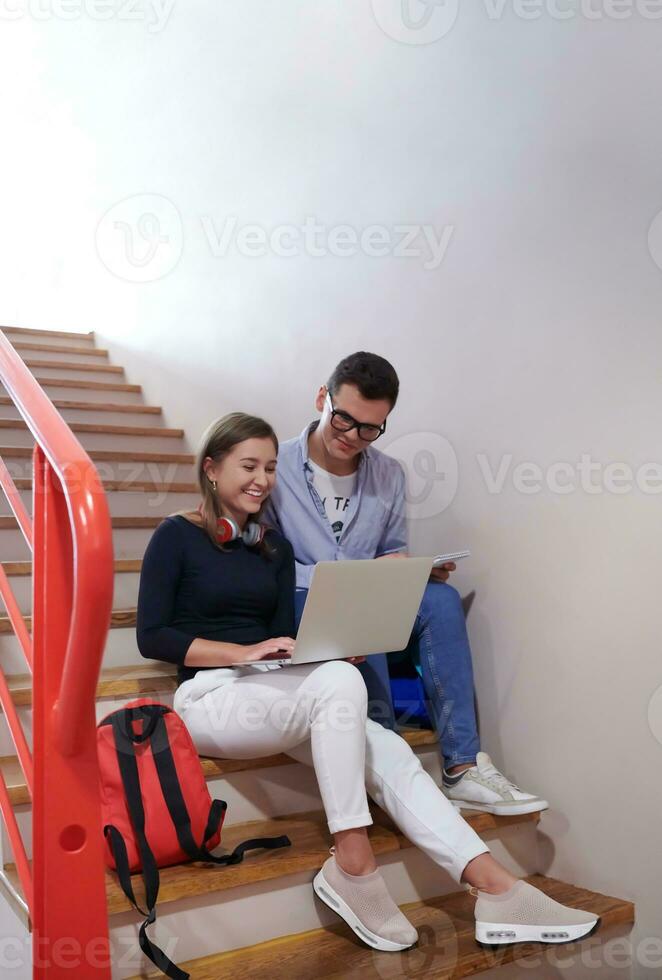 students use modern technology in school to create projects photo