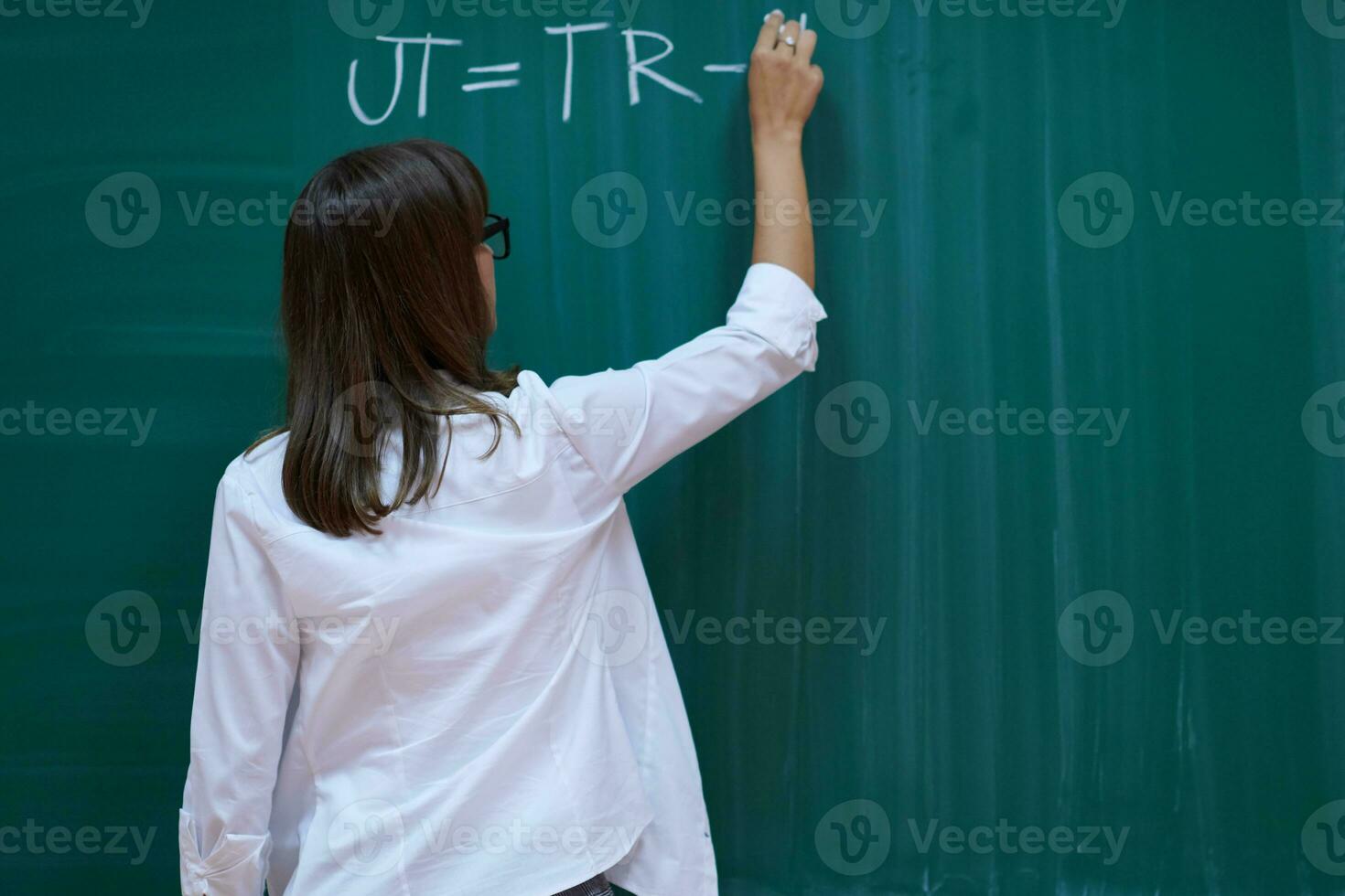 the professor explains the task on the board photo