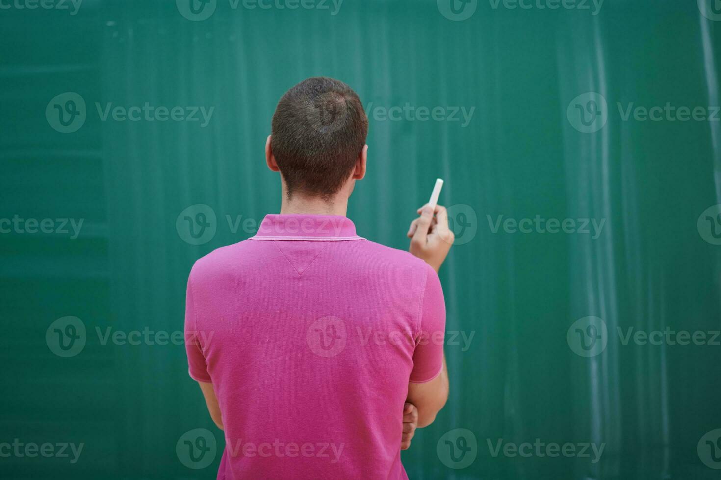 the student does the task on the board photo