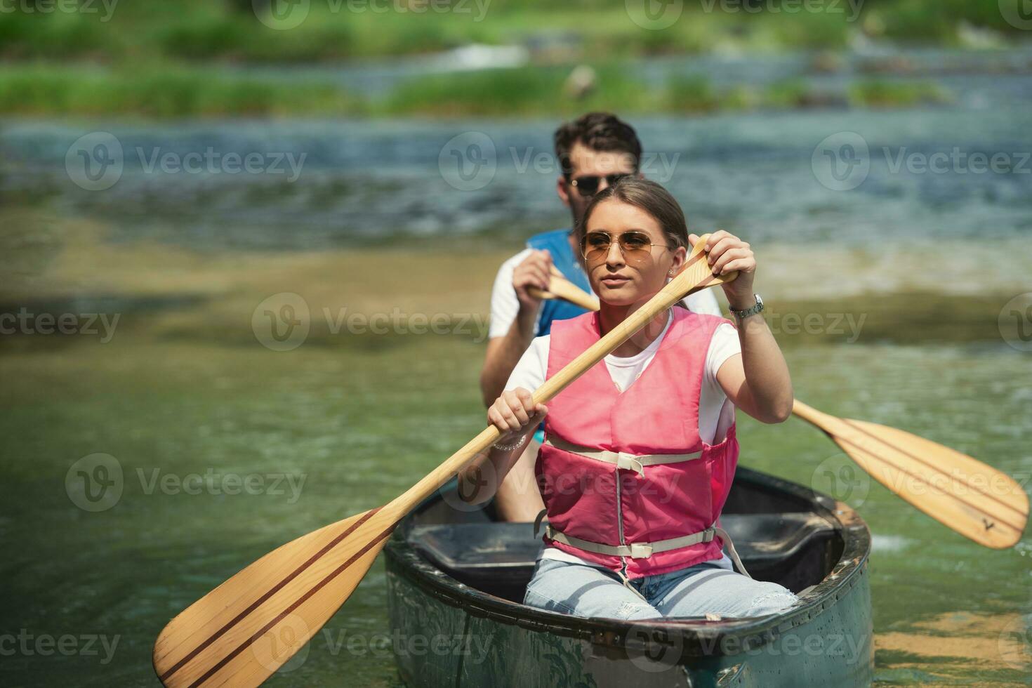 couple of conoining on wild river photo