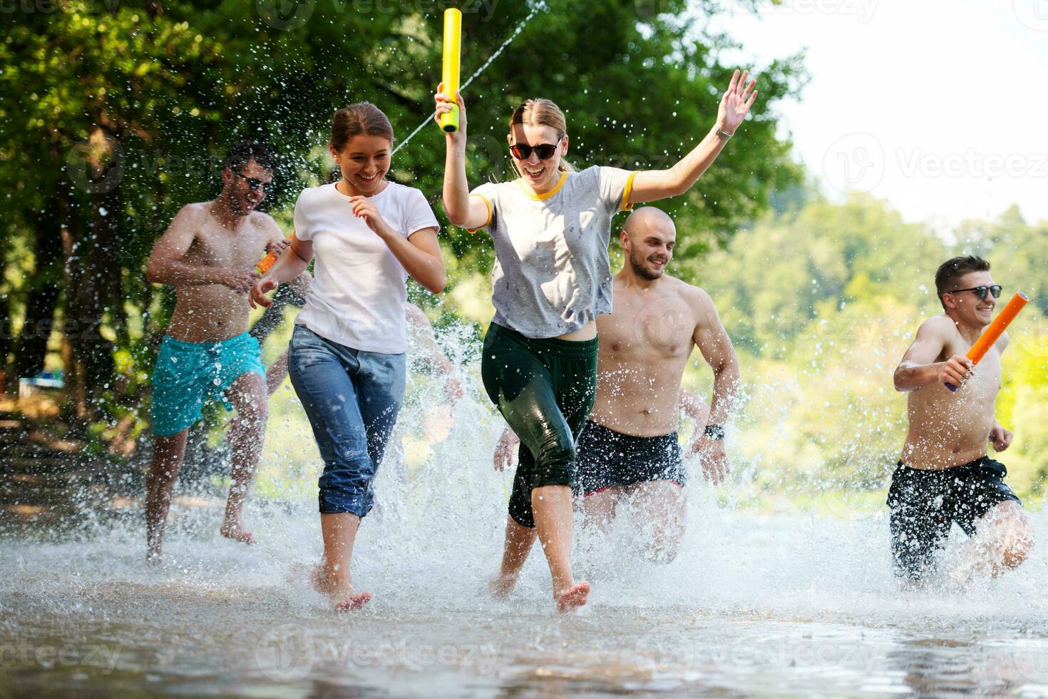 summer joy friends having fun on river photo