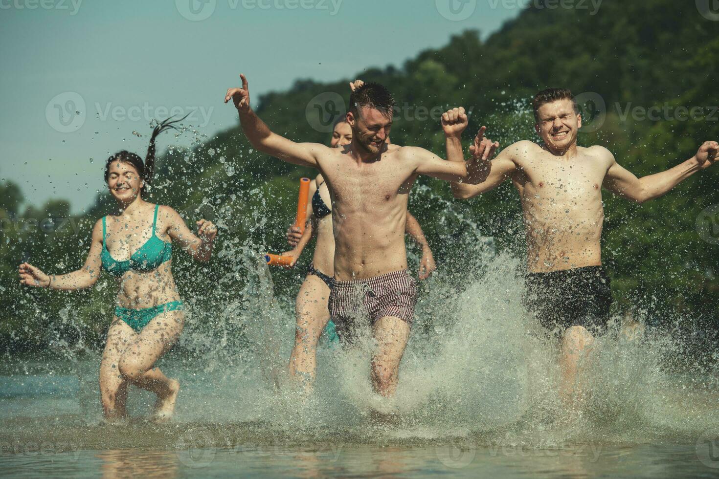 summer joy friends having fun on river photo