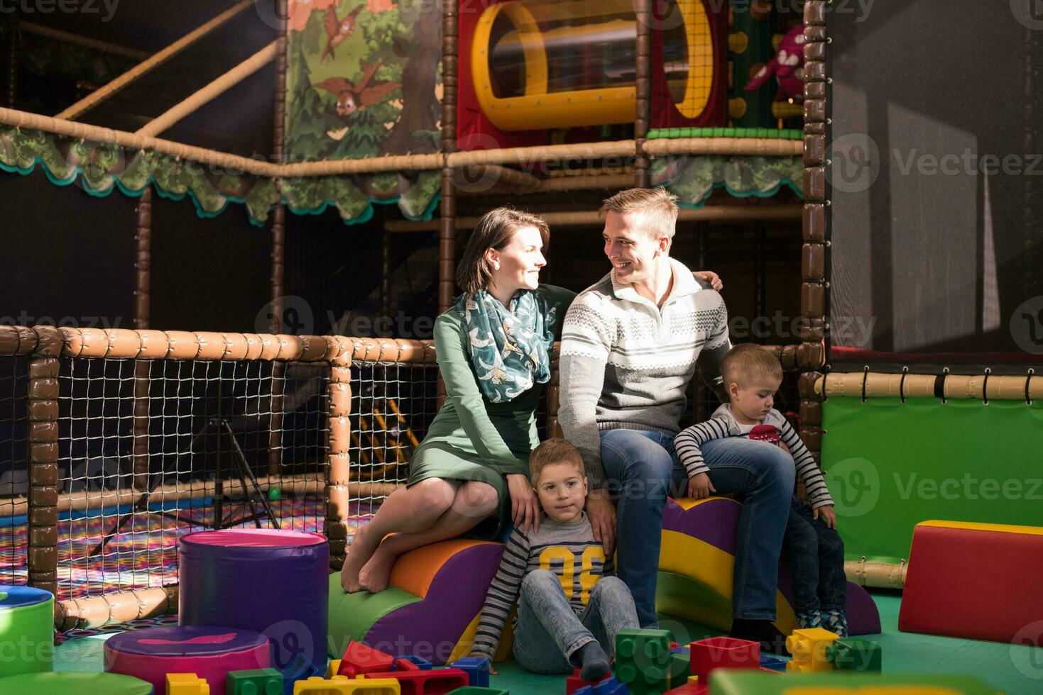 parents having fun with kids photo