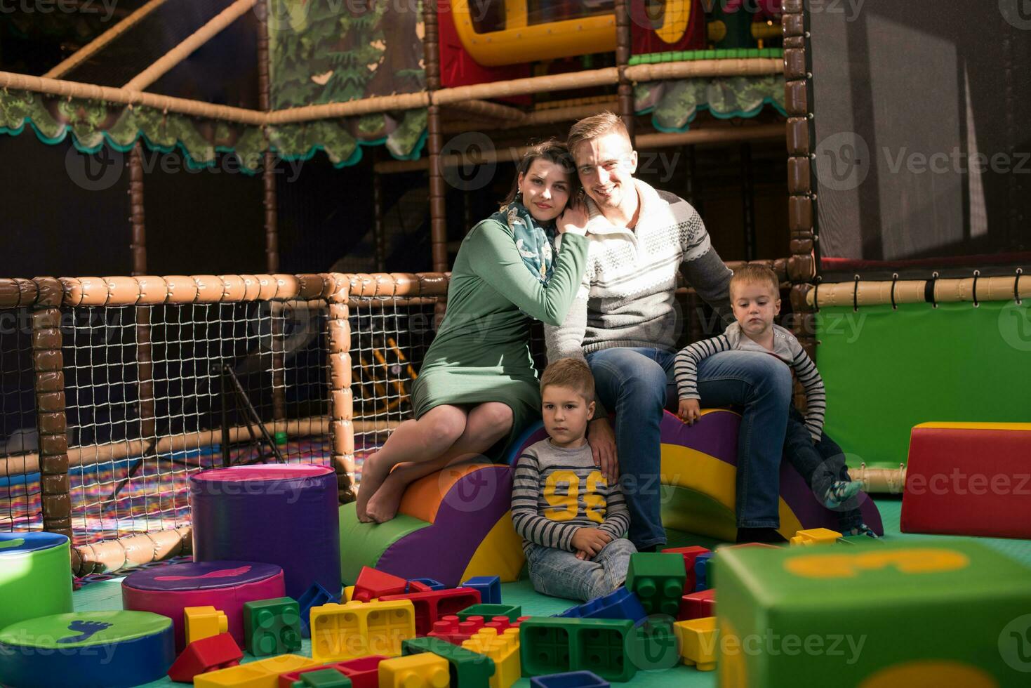 parents having fun with kids photo