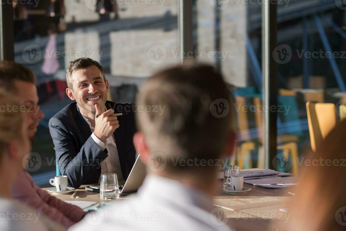 Business Team At A Meeting at modern office building photo