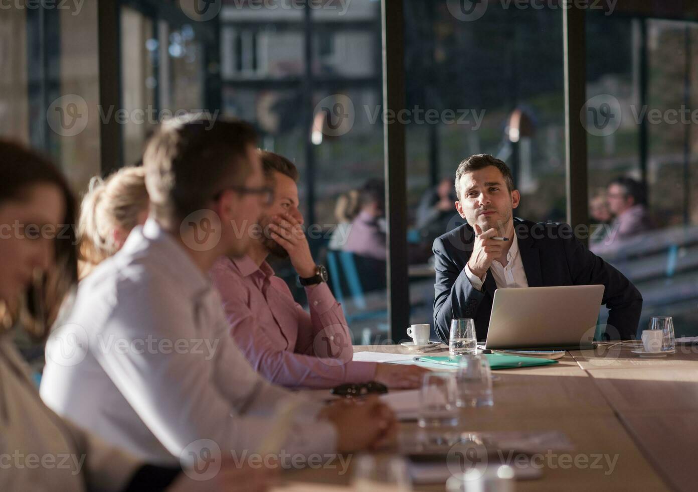 Business Team At A Meeting at modern office building photo