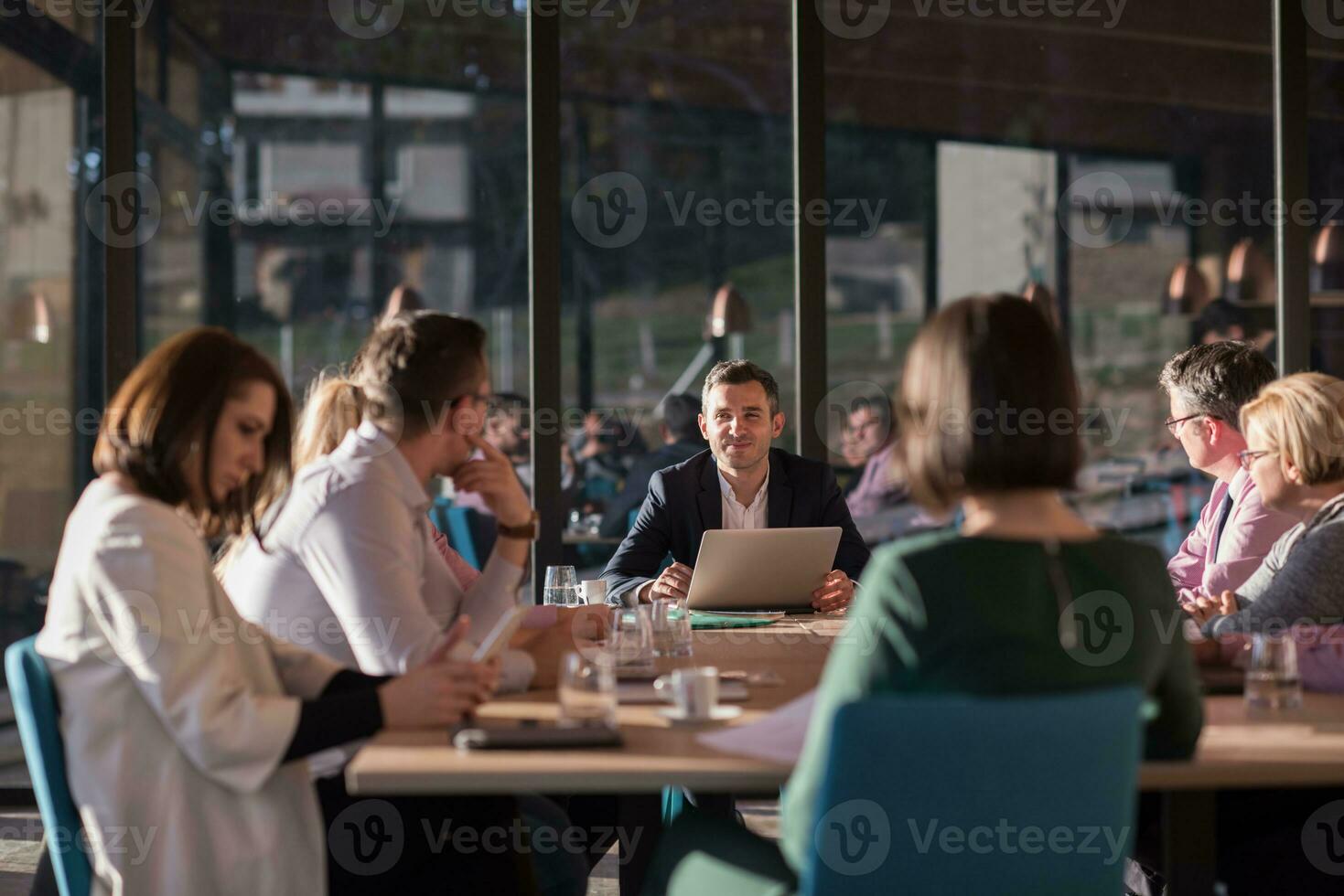 Business Team At A Meeting at modern office building photo
