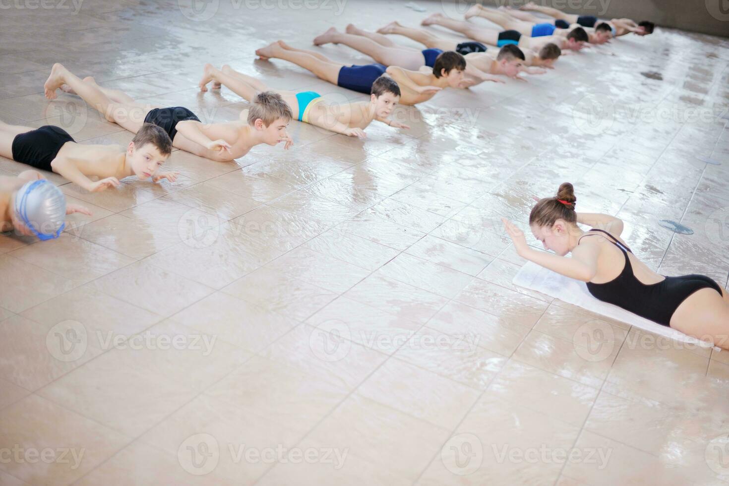 happy children group  at swimming pool photo