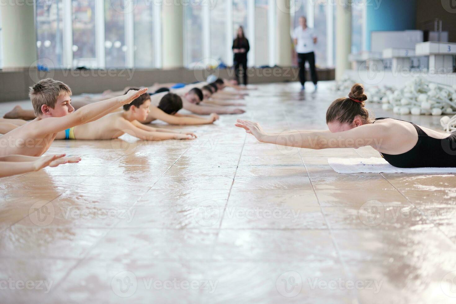 happy children group  at swimming pool photo