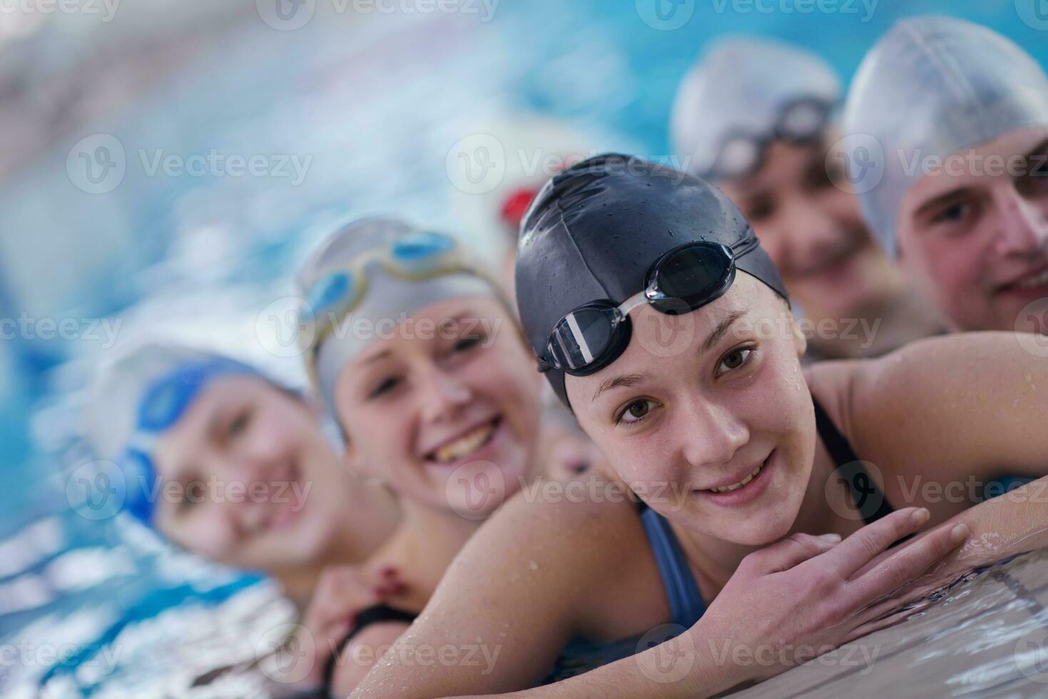 happy children group  at swimming pool photo