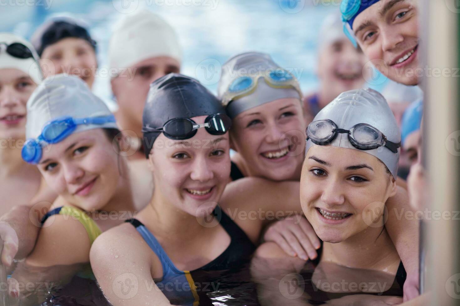 happy children group  at swimming pool photo