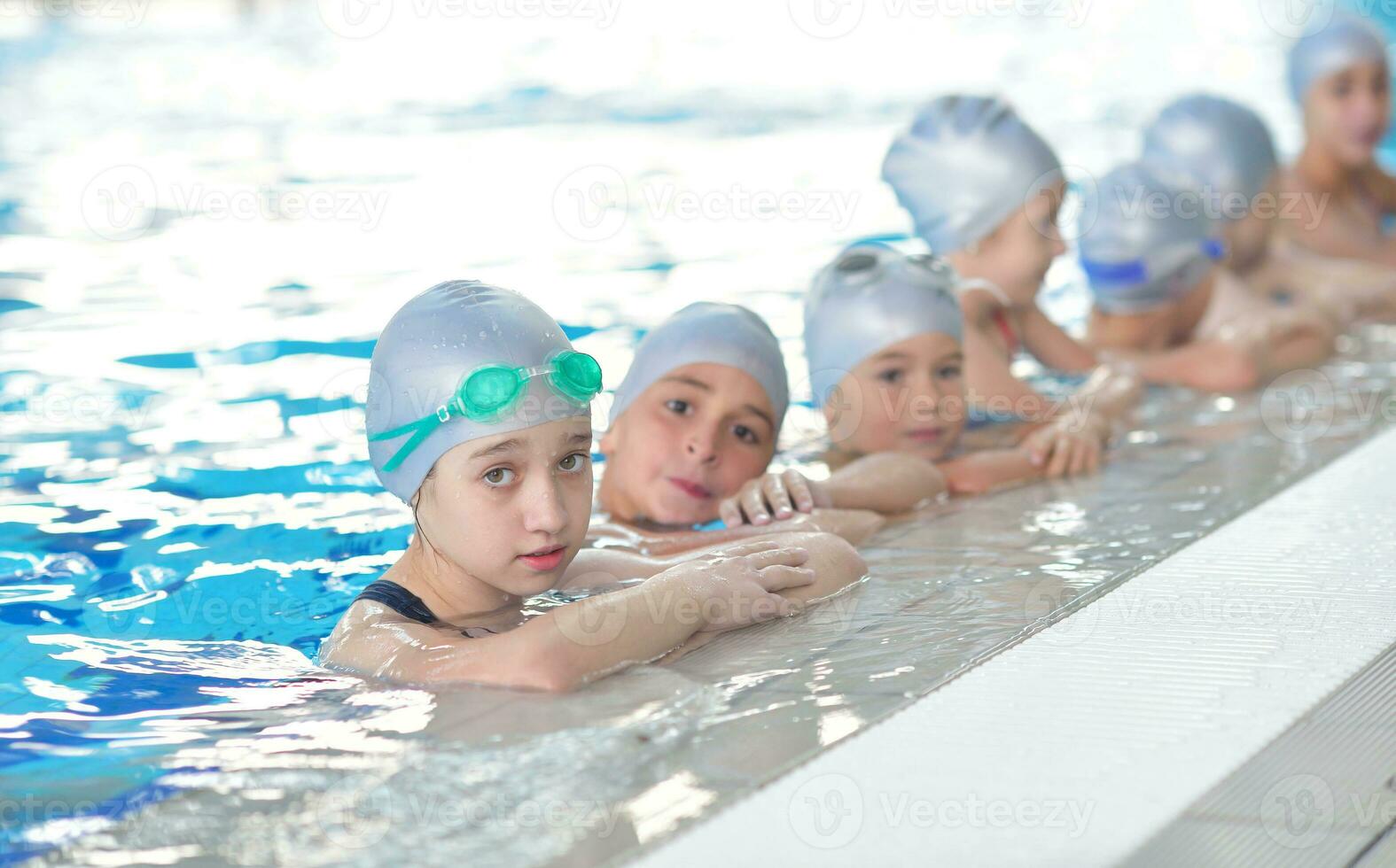 children group  at swimming pool photo