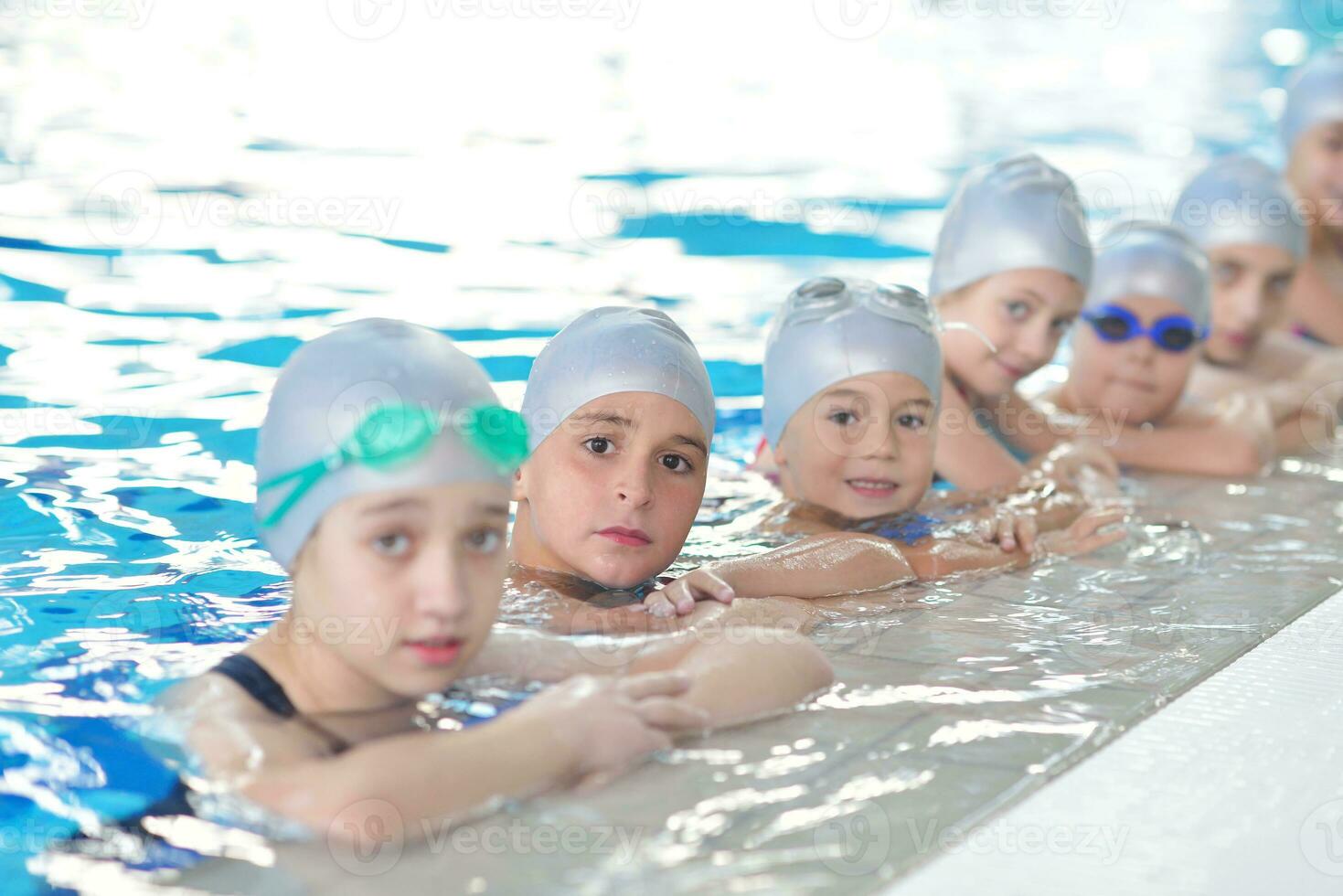 children group  at swimming pool photo