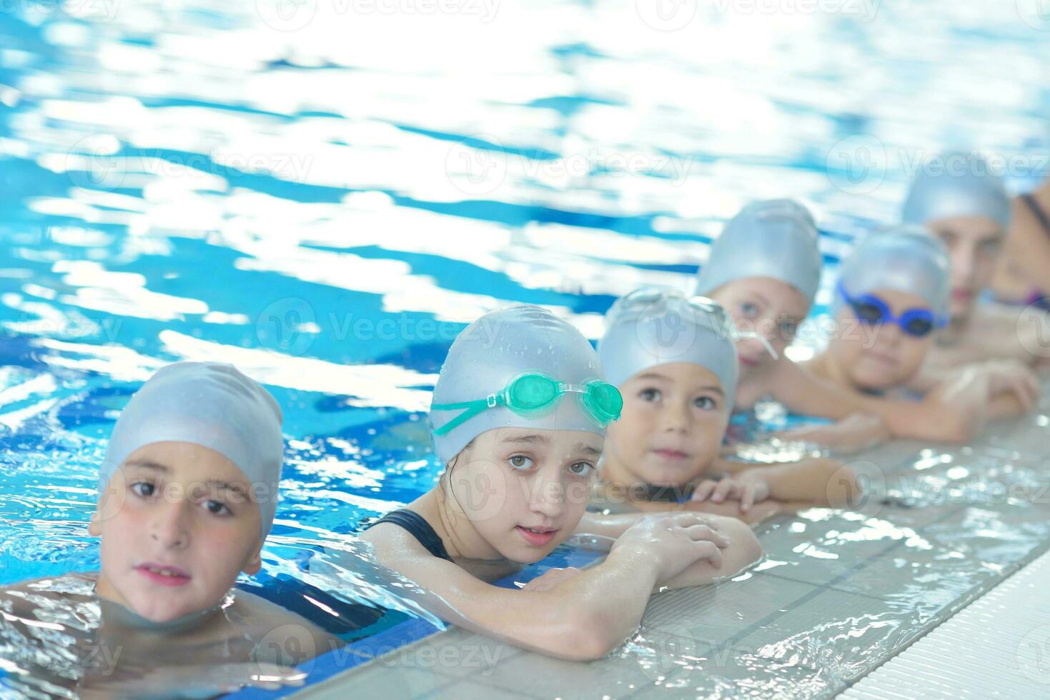 children group  at swimming pool photo