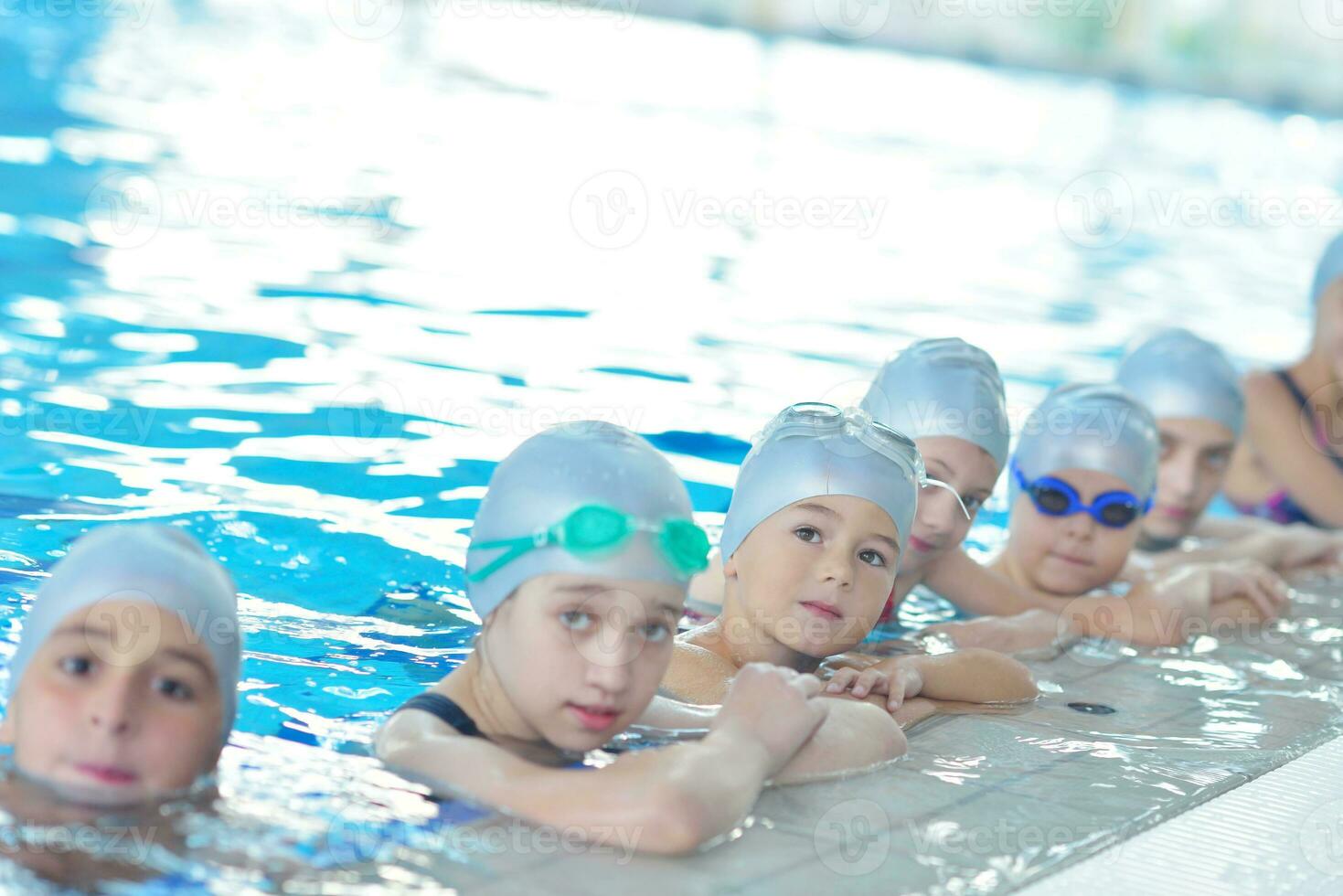 children group  at swimming pool photo